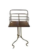 An Edwardian mahogany and tubular brass two division revolving magazine stand, width 40cm, depth