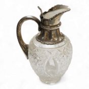 An Edwardian silver mounted cut glass claret jug, by Walker & Hall, Birmingham, 1904, height 21.