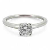 A diamond ring, claw-set with a brilliant-cut diamond weighing approximately 0.52 carats, mounted in