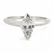 A diamond ring, claw-set with a marquise-shaped diamond weighing approximately 0.50 carats,
