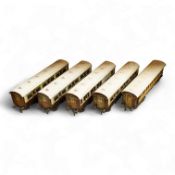 Five 0 gauge tinplate LNWR bogie coaches; four Bing for Bassett-Lowke 1921 series coaches; three