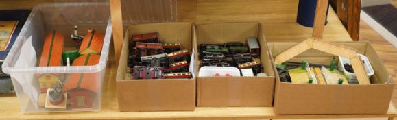 A collection of 0 gauge Hornby tinplate clockwork railway, including four BR locomotives, 17 freight