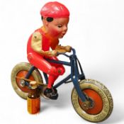 An early boxed Tri-ang Gyro-Cycle, with a gyroscope contained within the front wheel of the bicycle,
