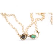 Two cultured pearl necklaces, comprising: one long strand of cultured pearls measuring approximately