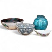An early Persian pottery bowl and vase, a Japanese bowl and another Chinese segment dish, tallest