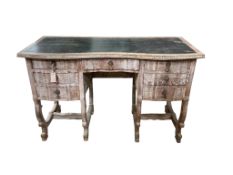 An early 20th century Continental bleached oak kneehole desk, width 122cm, depth 56cm, height 78cm