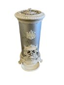 A 19th century French Godin cast iron stove, height 96cm