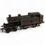 An 0 gauge Bing for Bassett-Lowke tinplate clockwork LNWR 4-4-0T locomotive, 3611, with original