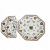 Two graduated Chinese famille rose octagonal dishes, Qianlong period, each painted with a central