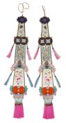 A pair of Chinese embroidered silk hanging pendants, early 20th century, each decorated with