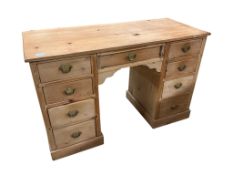 A late Victorian pine kneehole dressing table, width 122cm, depth 51cm, height 78cm