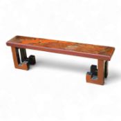 A Chinese red lacquered stand, 39cm wide