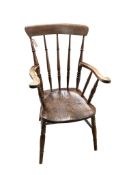 A Victorian elm and beech Windsor armchair, width 59cm, depth 46cm, height 100cm