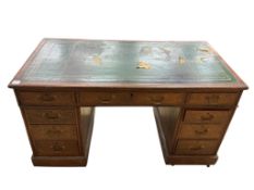 A Victorian oak pedestal desk, width 136cm, depth 72cm, height 75cm