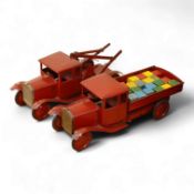 Two 1930's/40's Tri-ang large scale tinplate trucks, both with similar frames and cabs, one as a