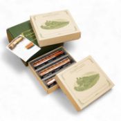 A boxed 0 gauge Darstaed tinplate Metropolitan Railway set of bogie coaches, a rake of five