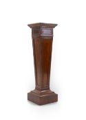 An Edwardian mahogany pedestal of blind fret tapered form on stepped square base, 32cm wide, 114cm