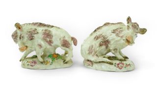 A pair of early Derby porcelain models of wild boars, c.1752-55, each naturalistically modelled