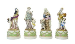 A set of four large Meissen style 'Four Seasons' groups and separate pedestals, each with pseudo