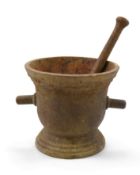 A large 18th/19thc cast iron mortar and pestle, the mortar 29.5cm high