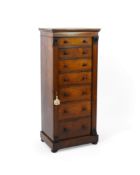 A Victorian rosewood Wellington chest fitted seven graduated drawers with acanthus carved twin