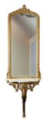 A Victorian giltwood and composition white marble top serpentine console table and pier mirror,