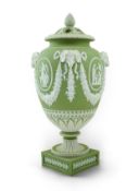 A Wedgwood green jasperware covered pot pourri urn, early 19th century, of ovoid form with a domed