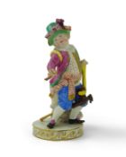 A Meissen figure of a boy on a hobby horse, 19th century, underglaze blue crossed swords mark and