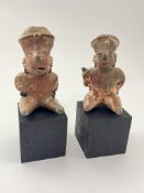 Two Pre-Columbian Nayarit polychrome seated figures, Western Mexico, 200 BC - AD 250, the smaller