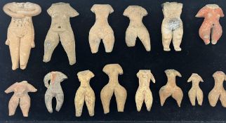 A group of fourteen pre-Colombian Tlatilco terracotta figures (lacking heads), 12th - 9th century