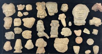 A large group of Pre-Columbian Aztec terracotta heads and figures, Mexico, 200 BC - AD 250, the