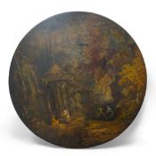 A Victorian japanned table top, depicting Indian grave robbers, 61cm diameter