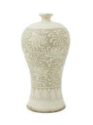 A Chinese Cizhou style meiping, late Qing, carved in relief with lotus flowers and foliage, unglazed