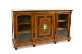 A Victorian marquetry inlaid and gilt metal mounted banded satinwood side cabinet with anthemion