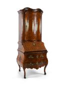 A mid 18th century North Italian or Maltese walnut and olive wood gilt metal mounted serpentine