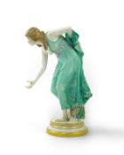 A Meissen porcelain figure, known as the 'Kugelspielerin', circa 1905, modelled by Walter Schott,