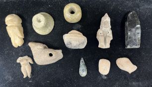A group of pre-Colombian terracotta objects and two jadeite objects, Mexico, including a jadeite ear