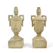 A pair of large 18th century style Italian cream painted plaster urns with flambé finials and