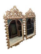 A pair of Italian painted carved giltwood wall mirrors, width 72cm, height 125cm