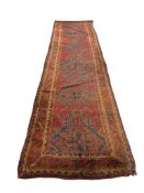 A Turkish Ousak runner, 396 x 96cm