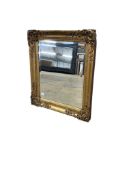 A Victorian rectangular giltwood and composition picture frame, now as a wall mirror, width 79cm,
