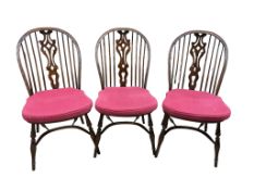 A set of six reproduction ash and elm Windsor dining chairs with crinoline stretchers, width 48cm,