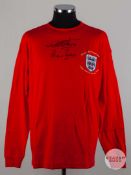 Red replica England 50th Anniversary autographed shirt.