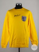 A replica yellow Gordon Banks autographed England shirt.