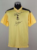 A yellow replica Tottenham Hotspur Steve Perryman and Glenn Hoddle autographed shirt &nbsp;