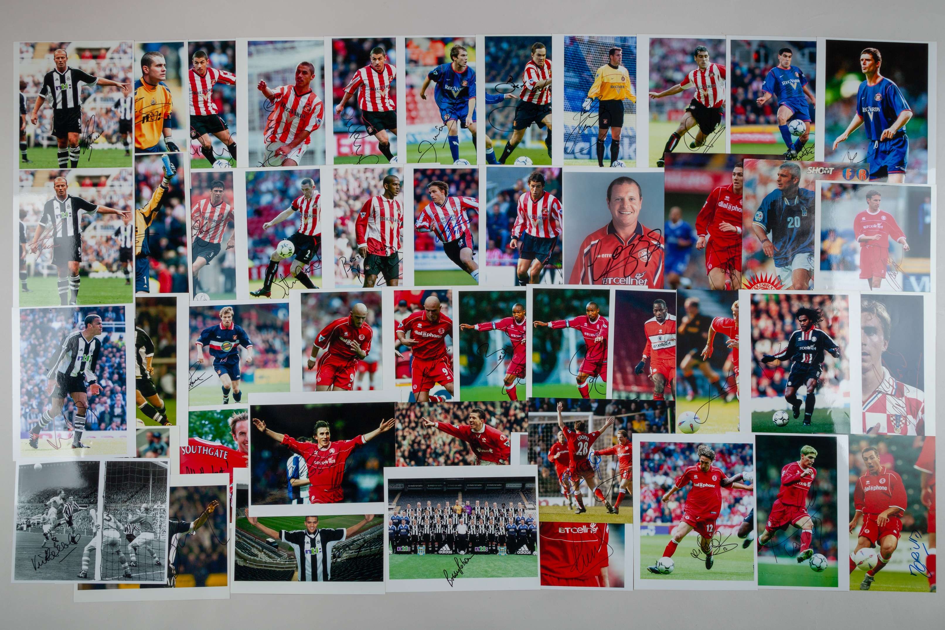 A large number of colour autographed photographic prints relating to North East Football.