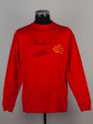 A red replica England Geoff Hurst and Martin Peters 50th Anniversary autographed shirt