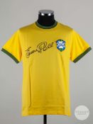 A replica yellow Pele autographed Brazil shirt.