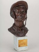 Bronze head & shoulders bust of the jockey Lester Piggott by Irish sculptor Gary Trimble.
