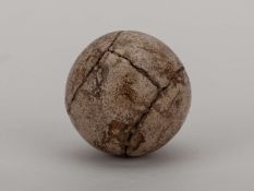 An early feather-filled golf ball.